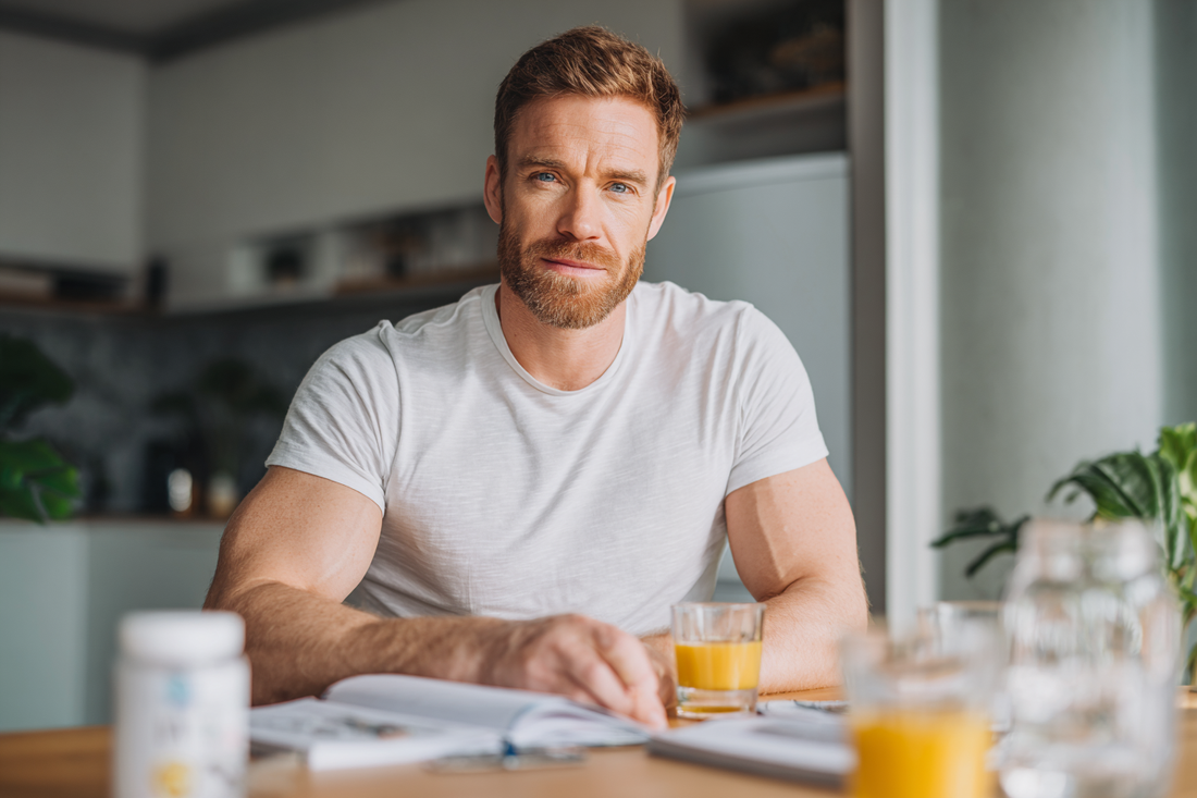 A modern man maintaining a steady wellness routine over time, showing consistency, discipline, and a calm long-term health mindset