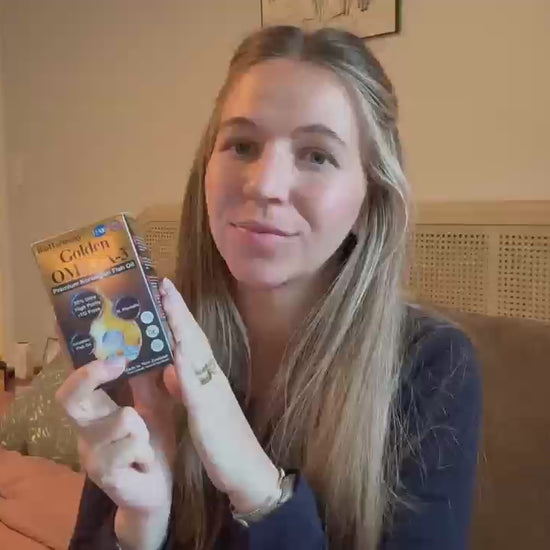Customer review video thumbnail of a woman holding BioHarmony Golden Omega-3 fish oil box in a bedroom (影片 / video)
