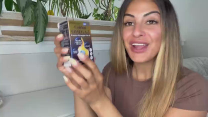 Customer review video thumbnail of a woman presenting BioHarmony Golden Omega-3 fish oil box with indoor plants in the background (影片 / video)
